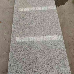 成都芝麻白光面毛板